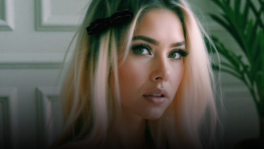 Blonde Model wearing the Queen Black Bow Hair Barrette