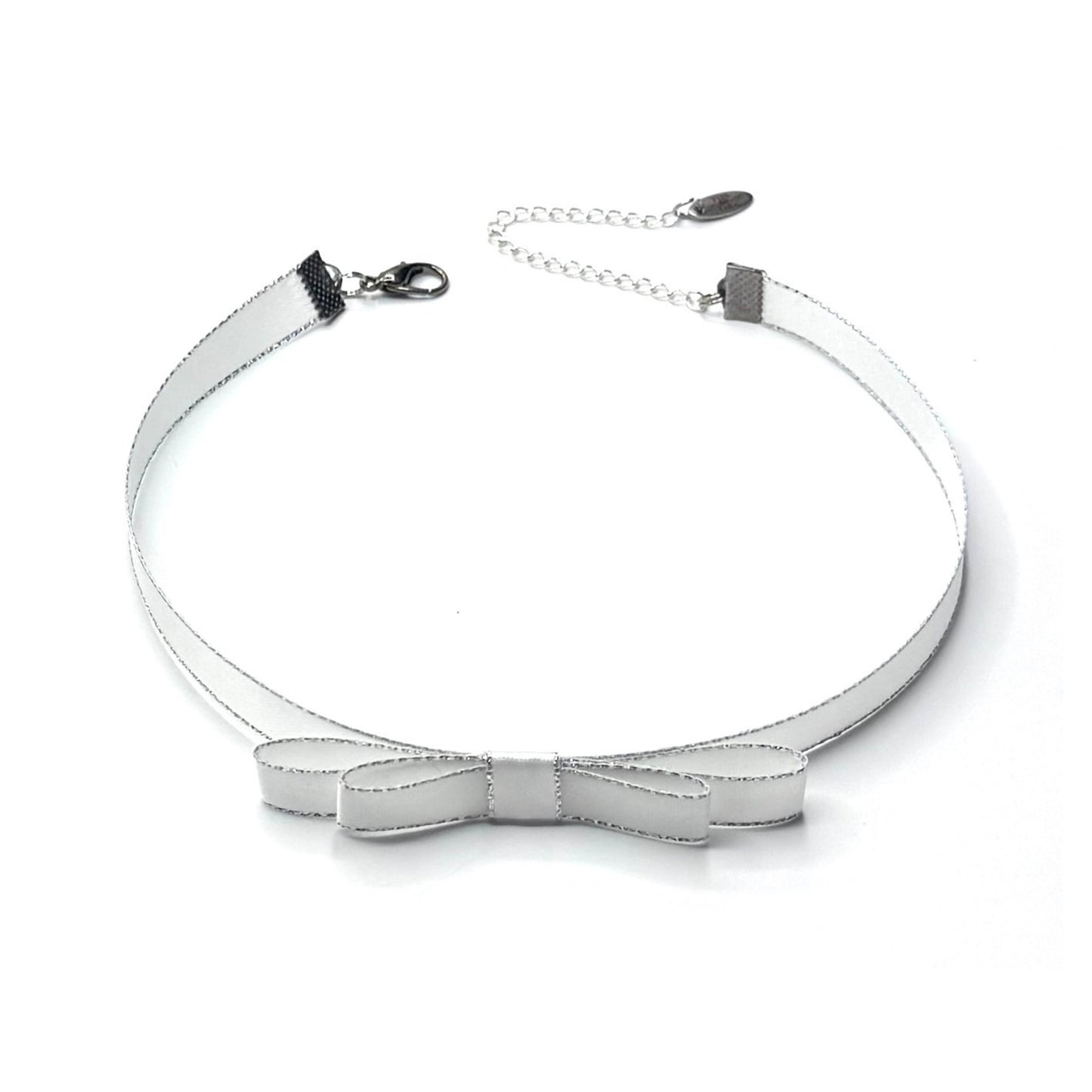 Silver bow-shaped choker necklace on a white background