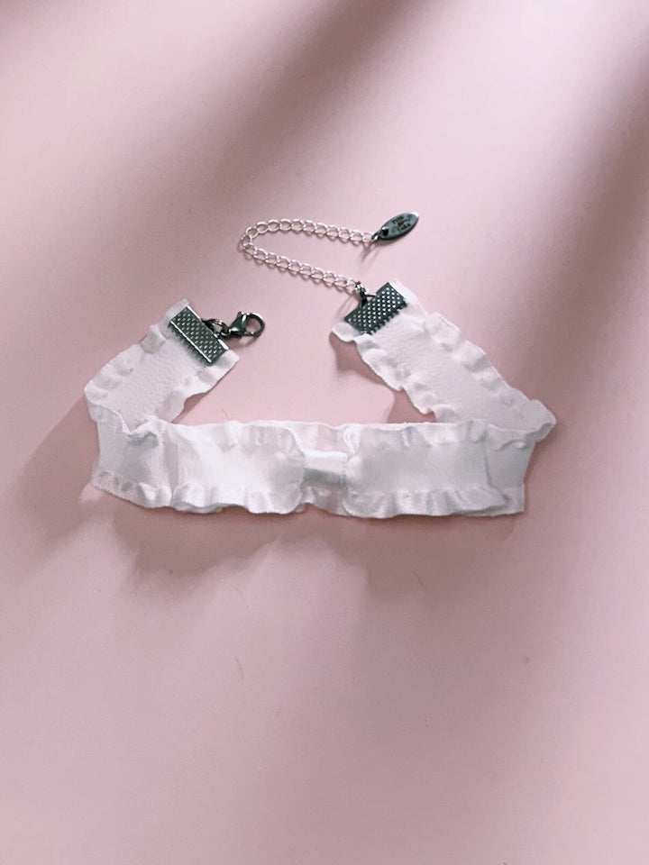 Maiden White Ruffled Anklet on Pink Background