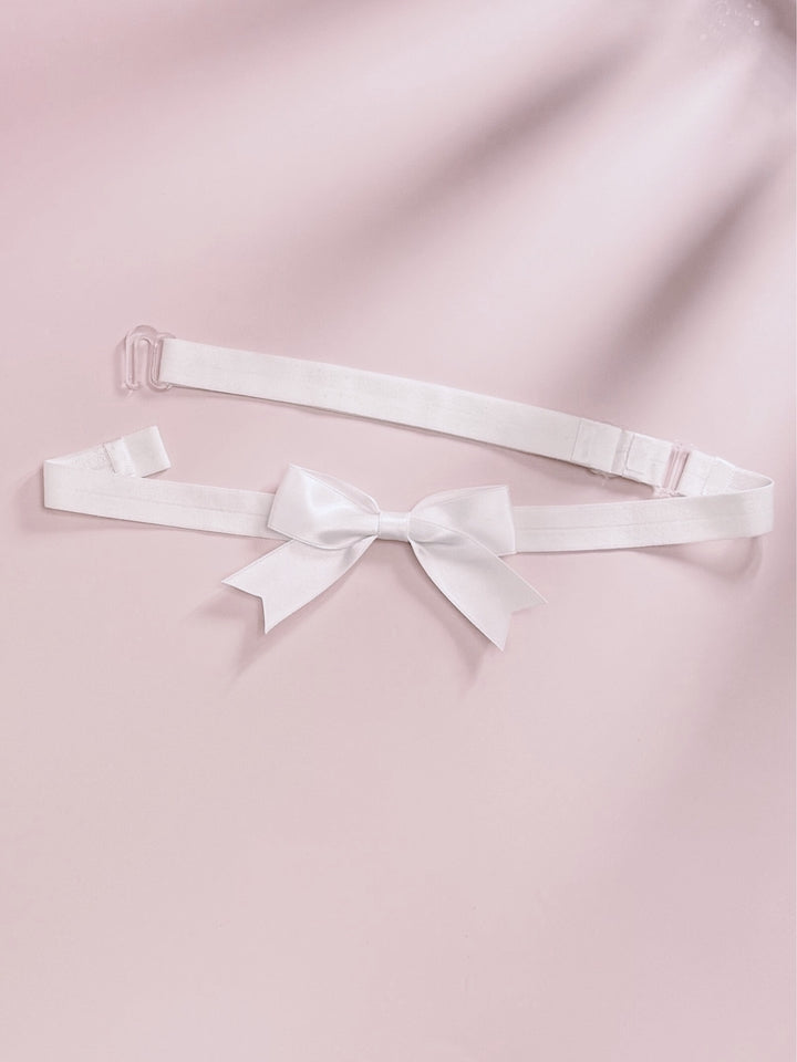 Yours Truly White Bow Belt on Pink Background