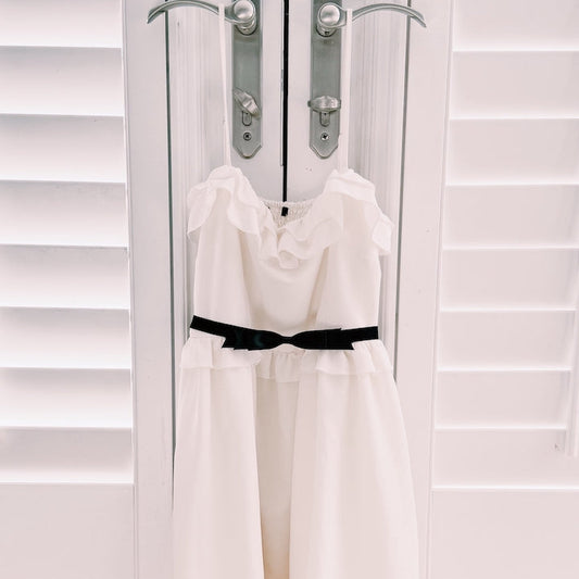 Enchantress Black Bow Adjustable Belt on White Dress