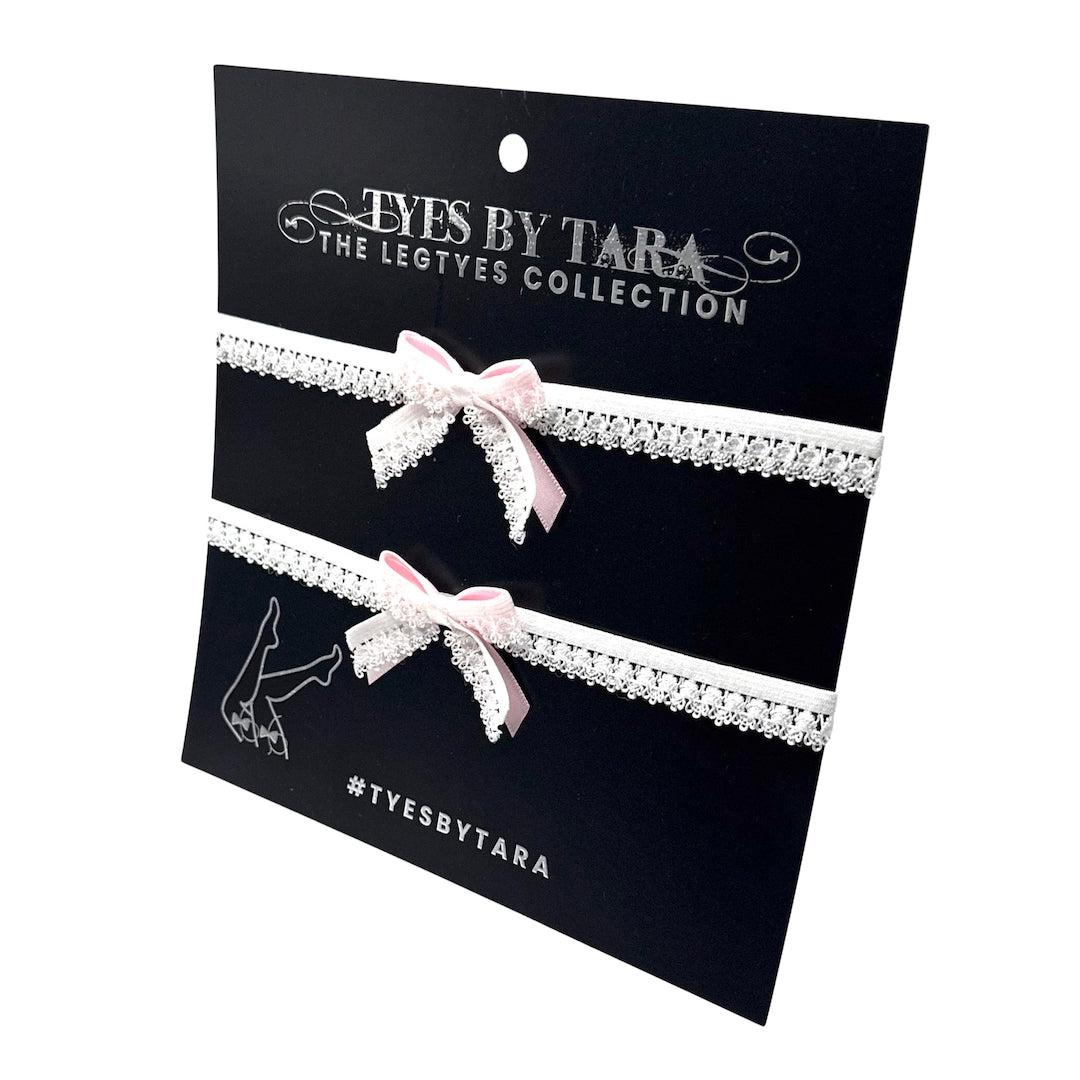 belle white bow leg garters on black card