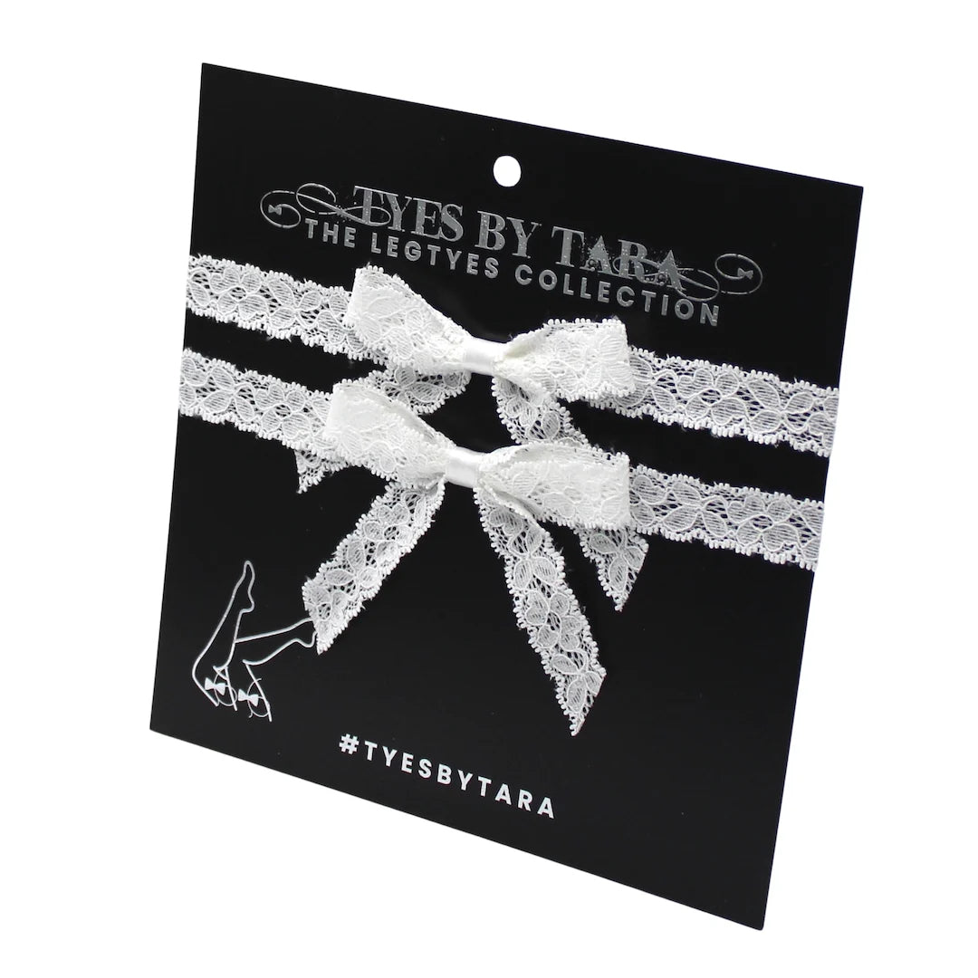 bougee white bow leg garters on black car
