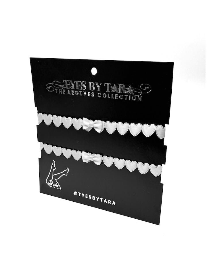 White Heart Leg Garters on Black Card
