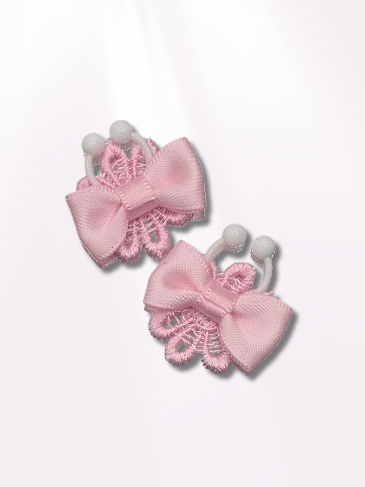 Pink Flower Bow Nipple Clamps Jewelry on Pink Background