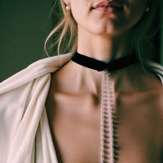 Model in White Blazer in Pearl Nipple Clamp Necklace