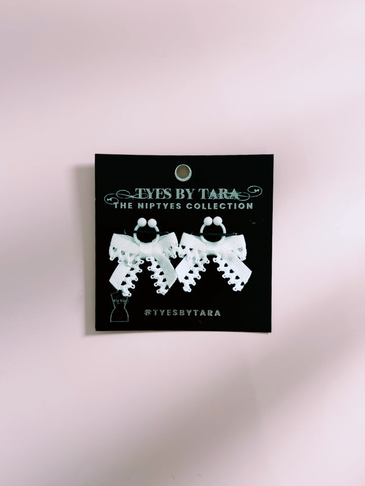 White Foxy Nipple Clamps on Card