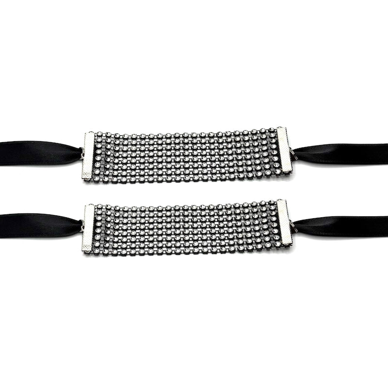 Sparkly Black Handcuffs Flatlay