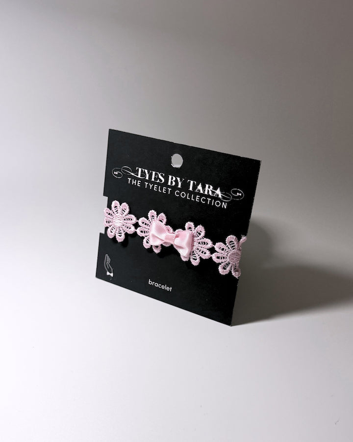 Blossom Pink Flower Bow Bracelet on Black Card