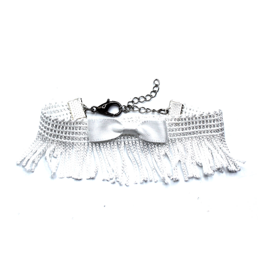 Fringe with Benefits White Fringe Bow Bracelet