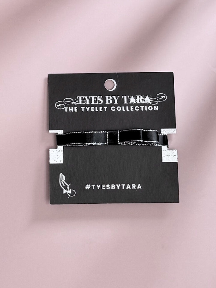 Packaging View of Silver Black Bow Bracelet