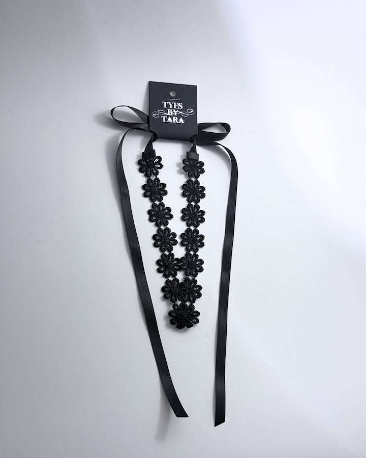 Blossom Black Flower Headband with Satin ties packaging view