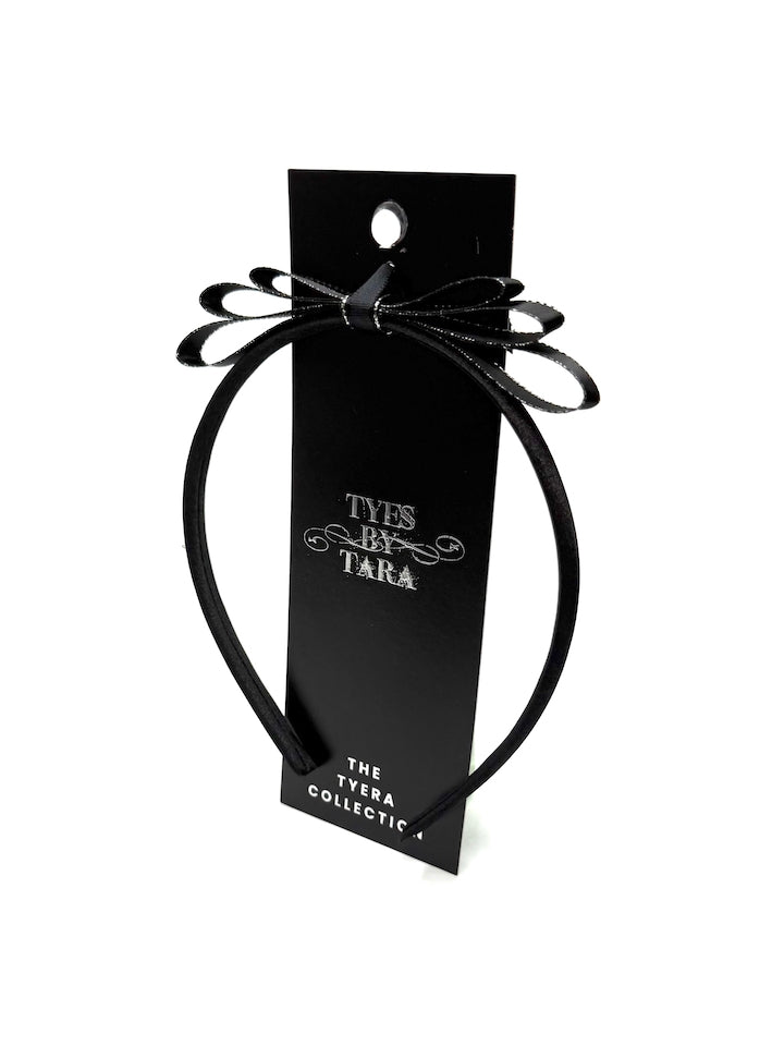 Queen Black Bow Headband on Black Card with White Background