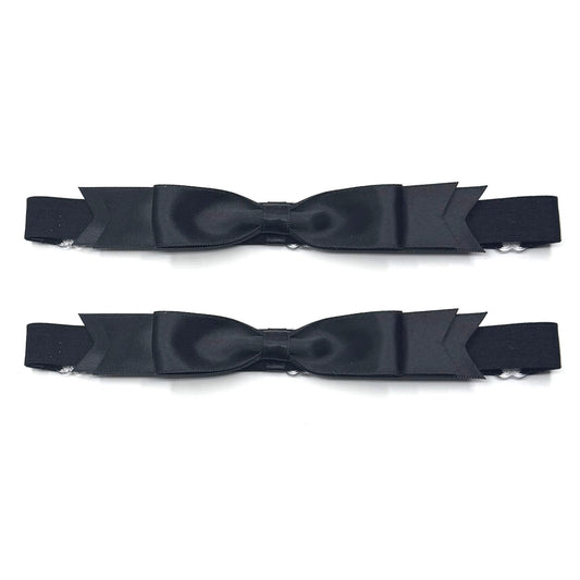 black satin bow leg garters on white background
