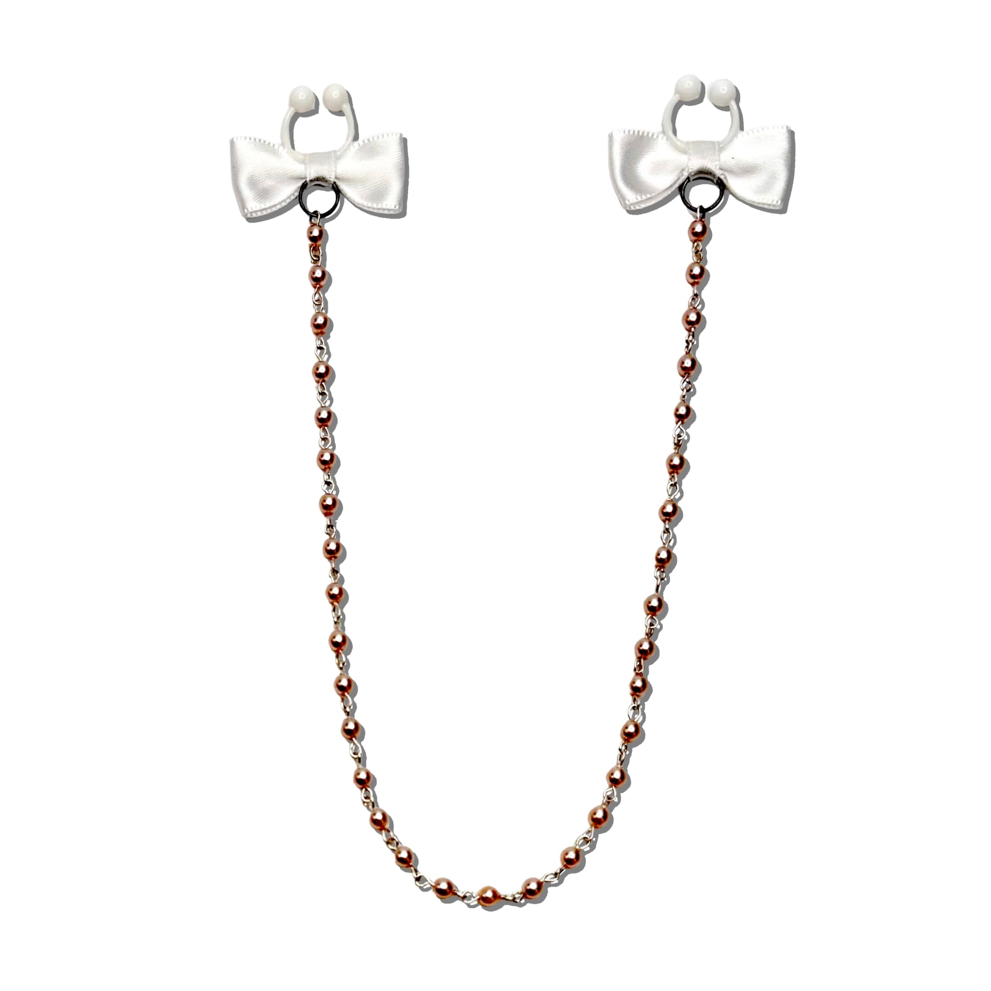 pearl nipple ties with white bows and pink pearls