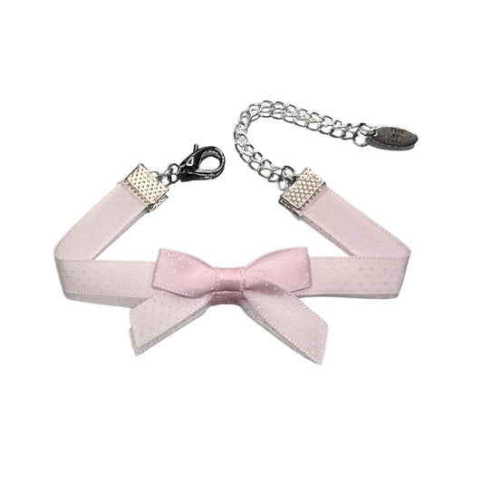 pinup pink bow bracelet of on white background