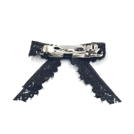 back view of tease black lace hair bow on white background