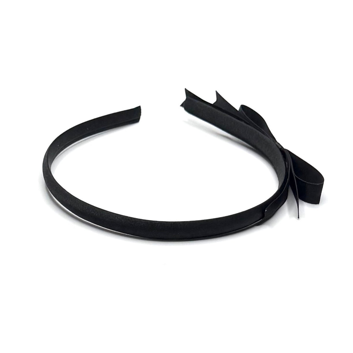 Black Satin Bow Headband on White Background showing the top of the band
