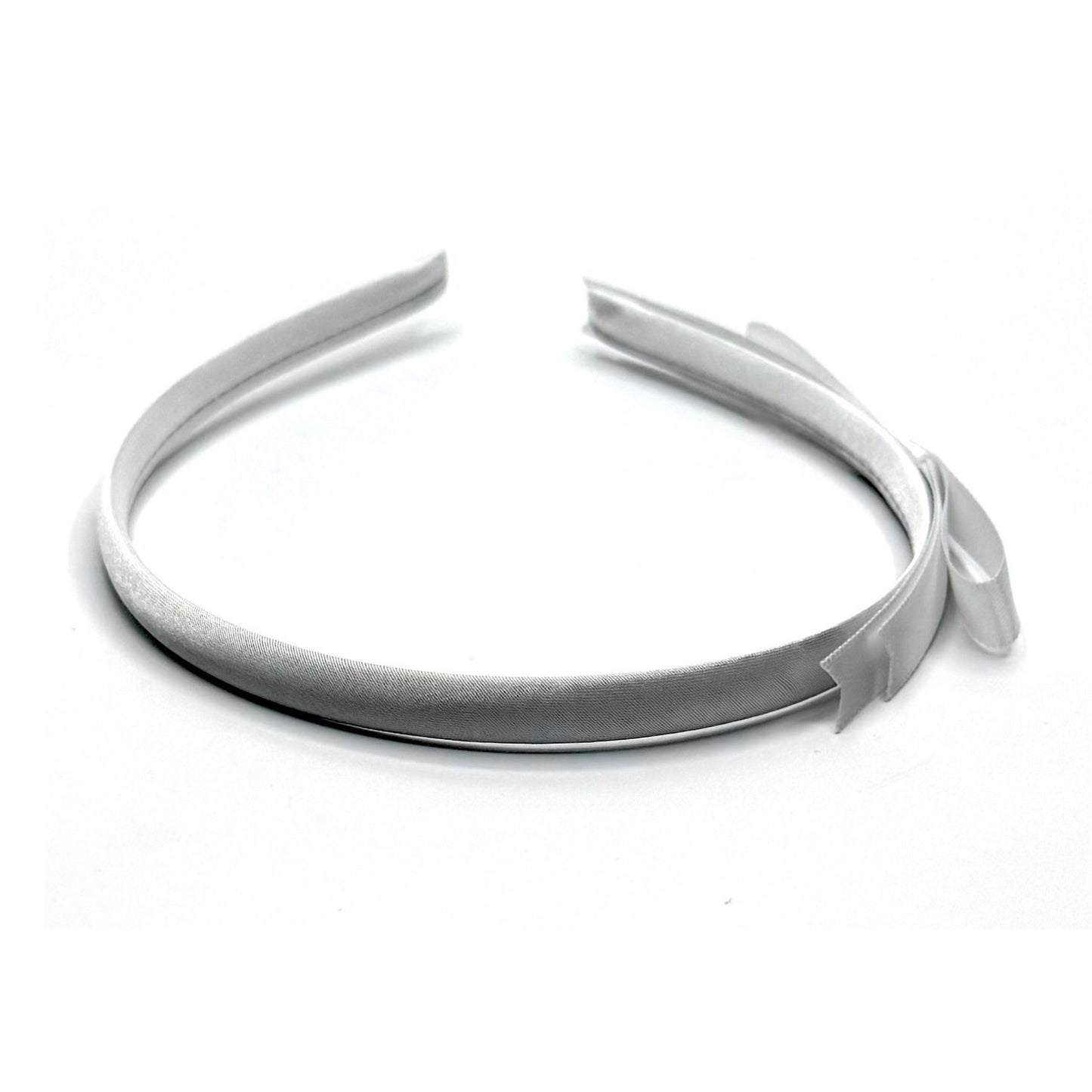 top view of white satin bow headband
