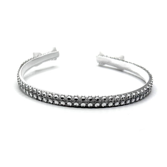 White Sparkly Headband with White and Silver Rhinestone Metsh with White Bows on the ends on a White Background Top View