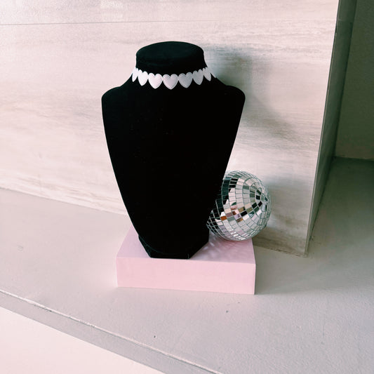 white heart choker on black neck form
