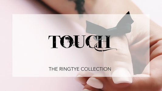Black Bow Ring on Manicured Hand