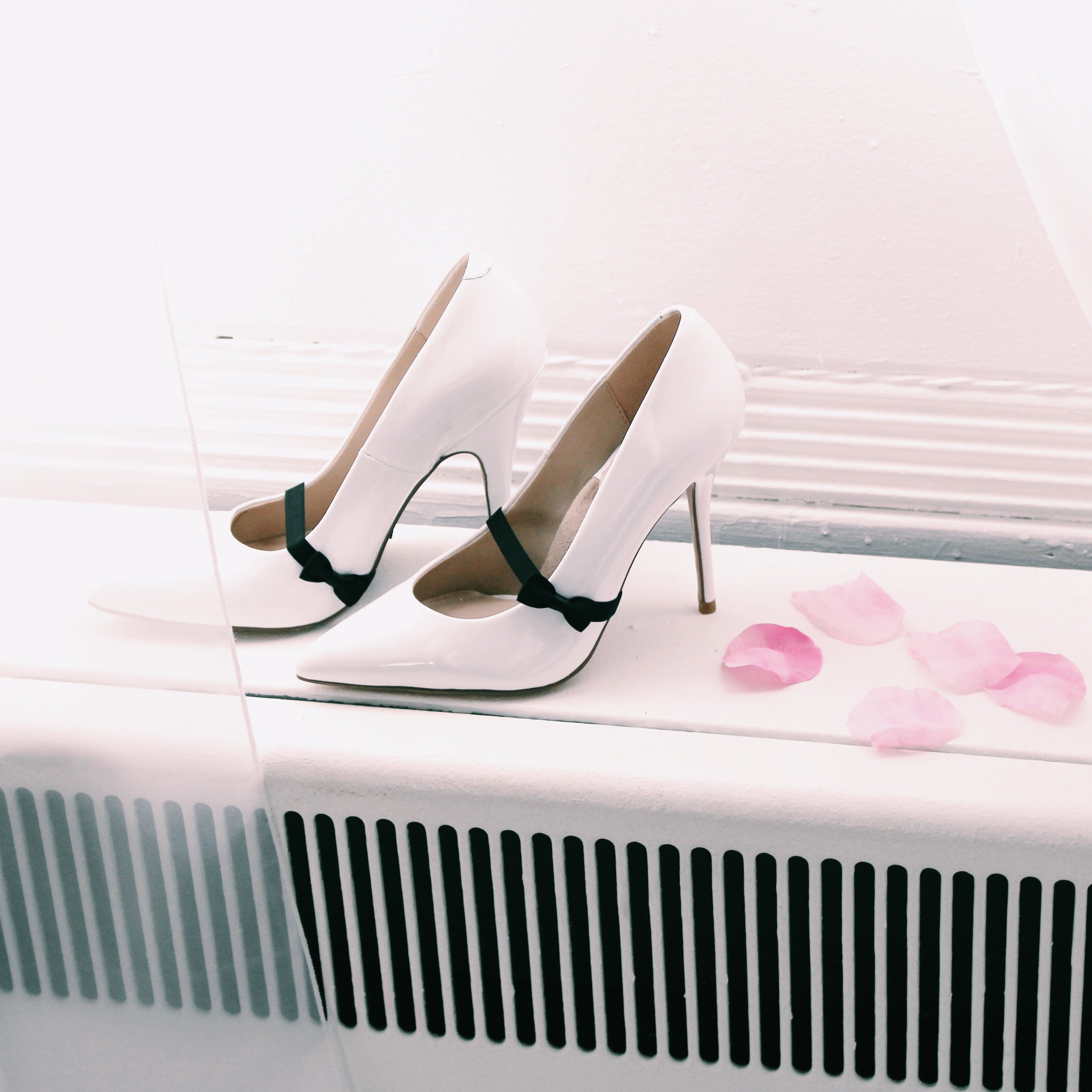 Black Bow Heel Straps on White Heels