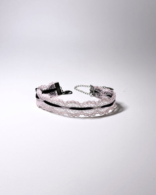 Chantilly Pink Lace Bow Anklet with Pink Lace and Black Bow Accents on a soft gray background