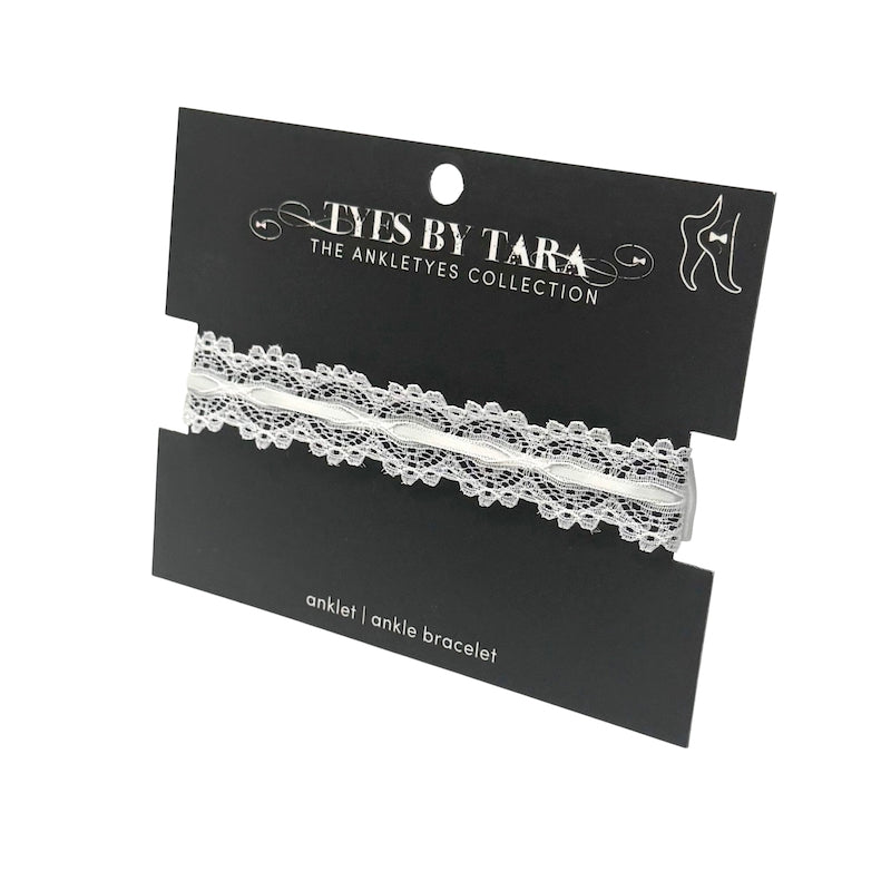 White Lace Anklet on Black Card on a white background