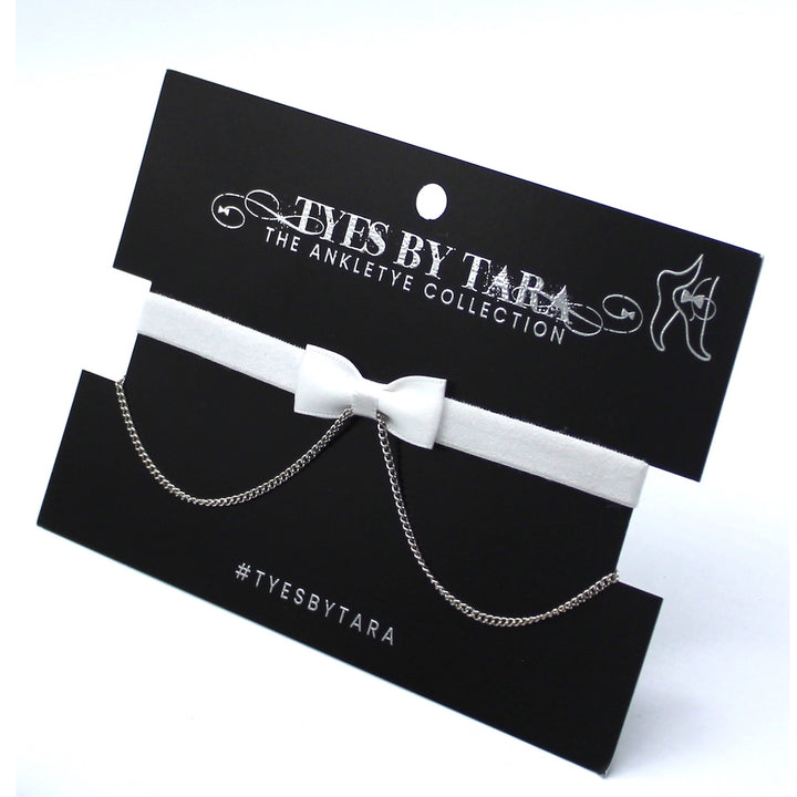 Heartbreaker White Bow Anklet on Black Card