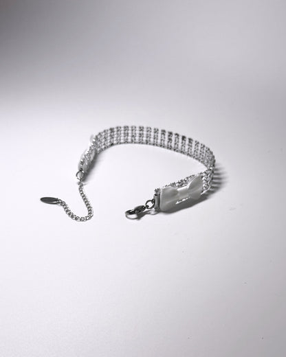 Back view of Vixen sparkly white bow anklet