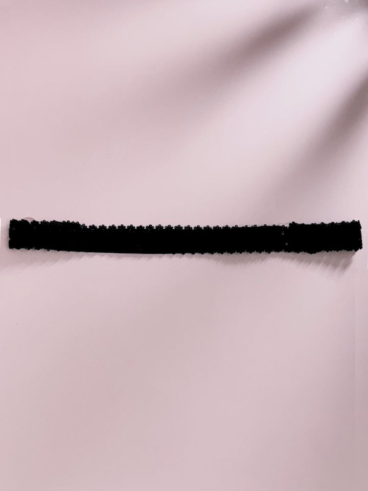 Lady Lingerie Black Bow Belt on Pink Background