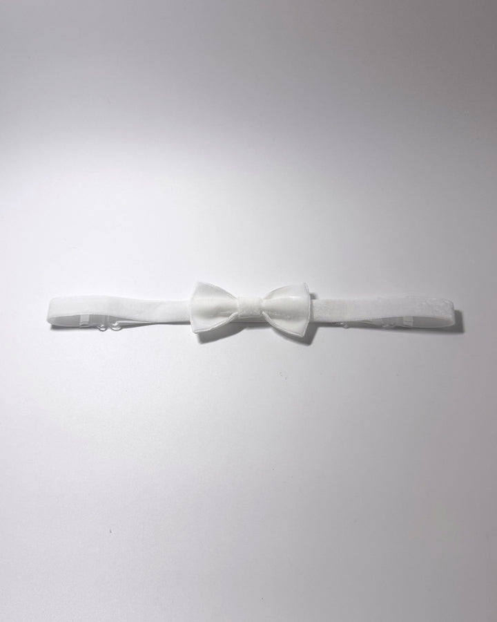 Madame Velvet White Adjustable Bow Belt on softly lit surface