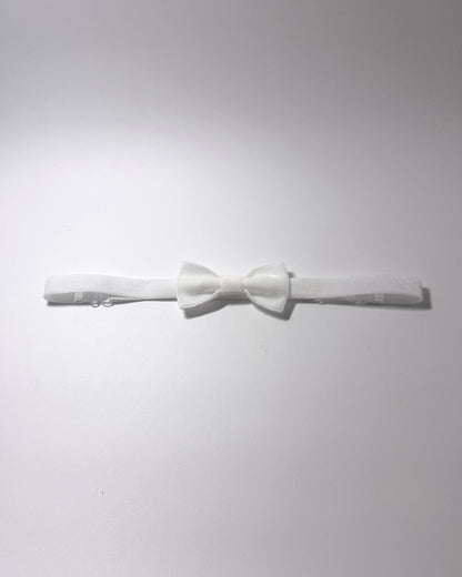Madame Velvet White Adjustable Bow Belt on softly lit surface