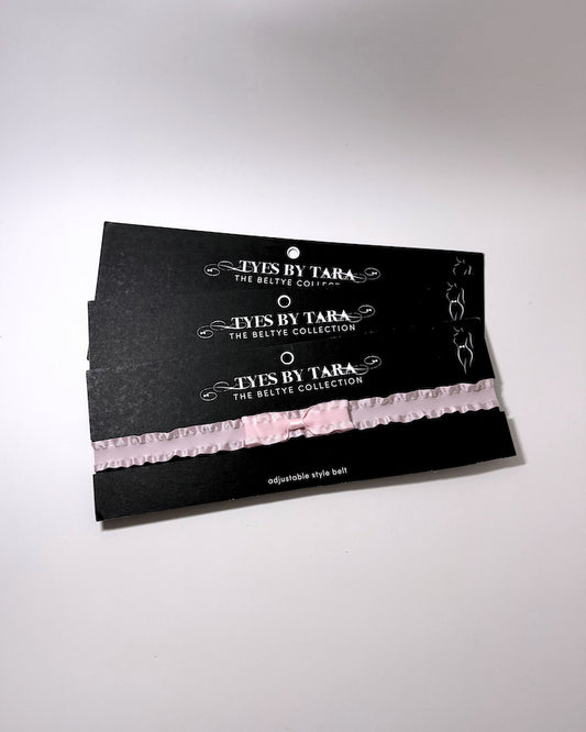 Maiden Pink Ruffled Bow Belt on Black Cards