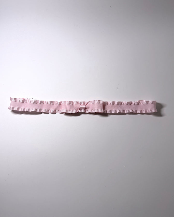 Maiden Pink Ruffled Bow Belt on light gray background
