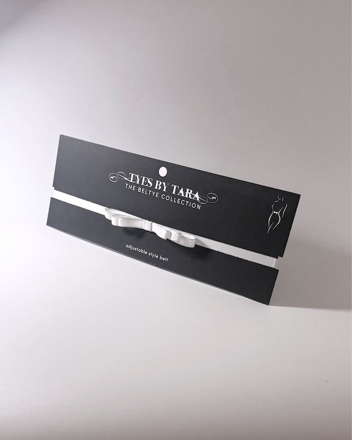 Queen White Bow Belt on Black Card