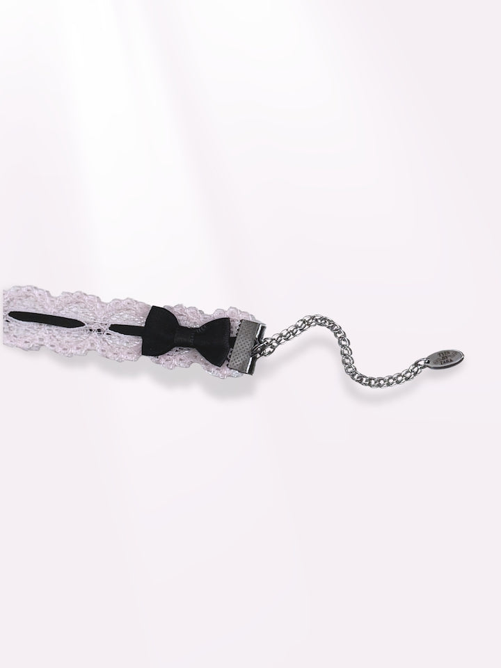 Chantilly Pink Lace Choker with Black Bows on light pink background