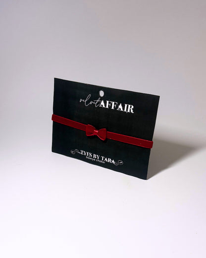 Packaging View of the Velvet Affiar red bow choker