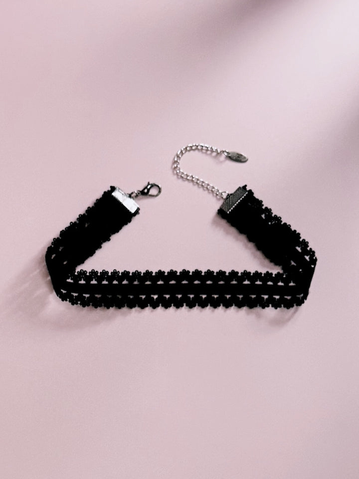 Lady Black Elastic Lingerie Choker on Pink Background