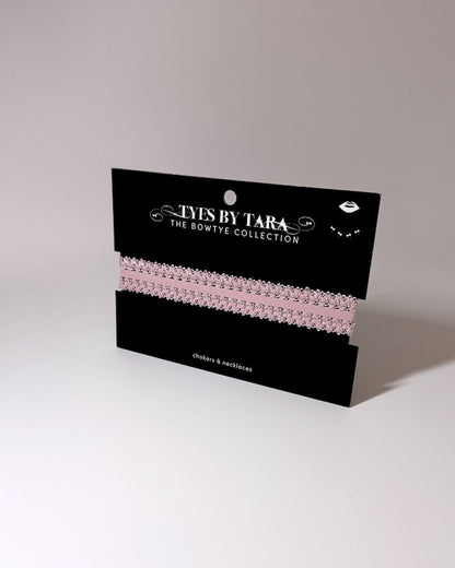 Lady pink elastic choker on black card