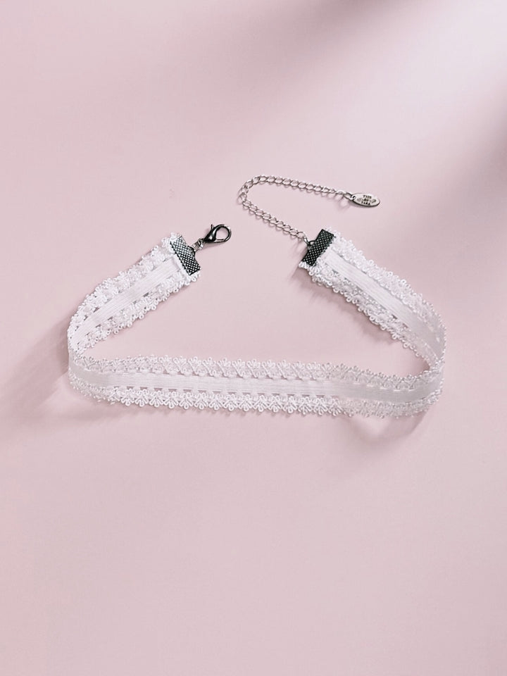 Lady White Lingerie Choker on Pink Background