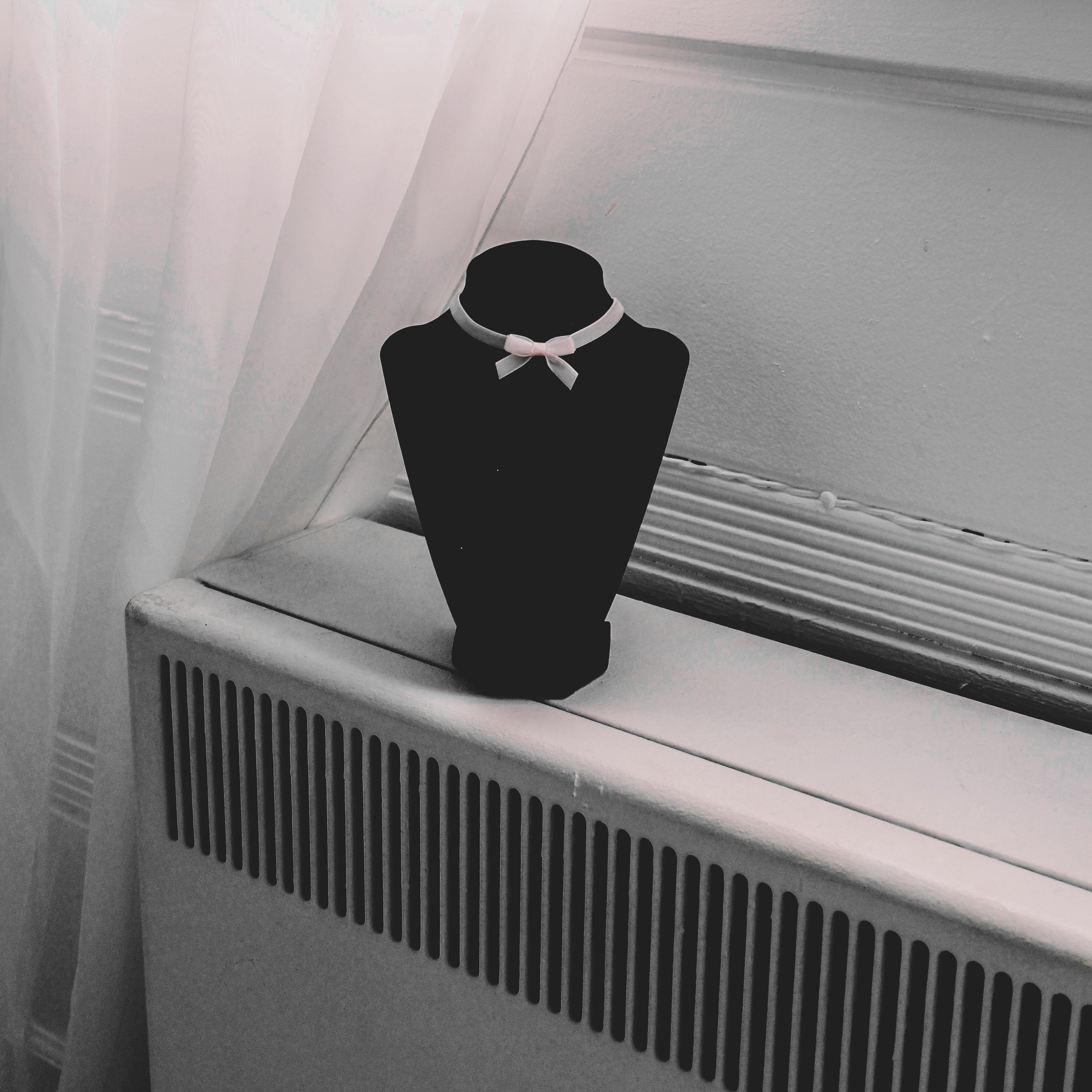 Pink Bow Choker on Black Neck Form