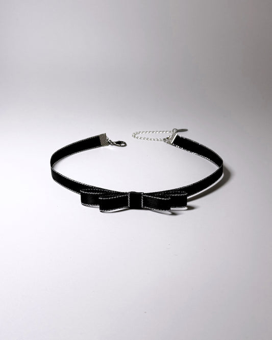 black metallic trimmed bow choker