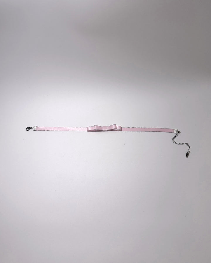 Pink Metallic Silver Bow Choker displayed flat showing lobster clasp and extender chain