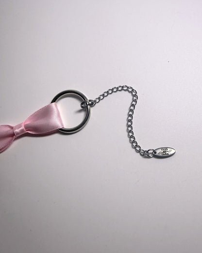 Runaway Pink Bow Choker with logo tag detail