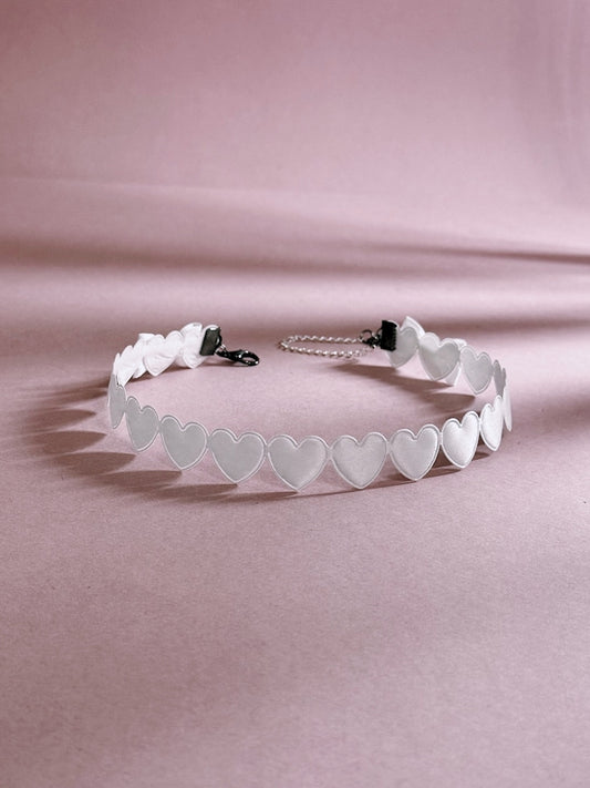 White Heart Choker on Pink Background