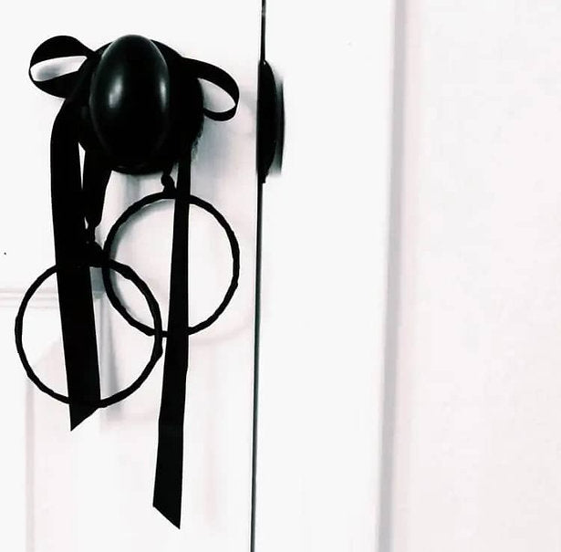 Black Bangle Handcuffs on Door 