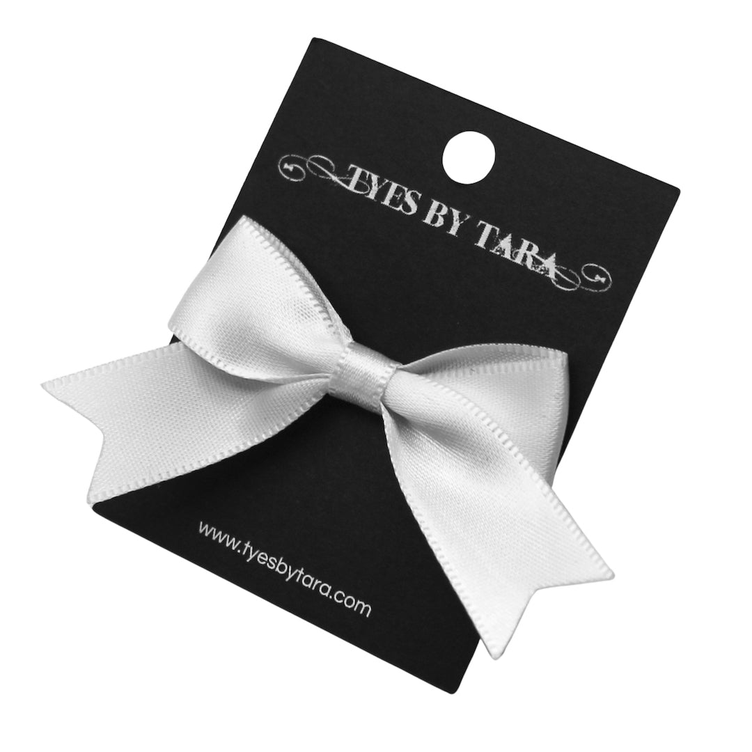 Bombshell White Bow Ring on Black Card