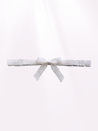 Bougee White Lace Bow Belt on Light Pink Background